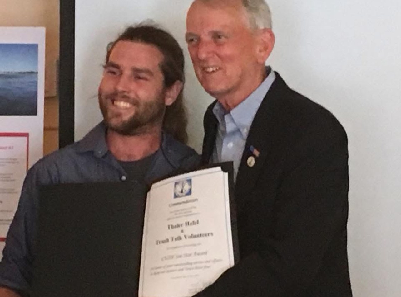 Thaler Hefel receiving recognition for volunteer work